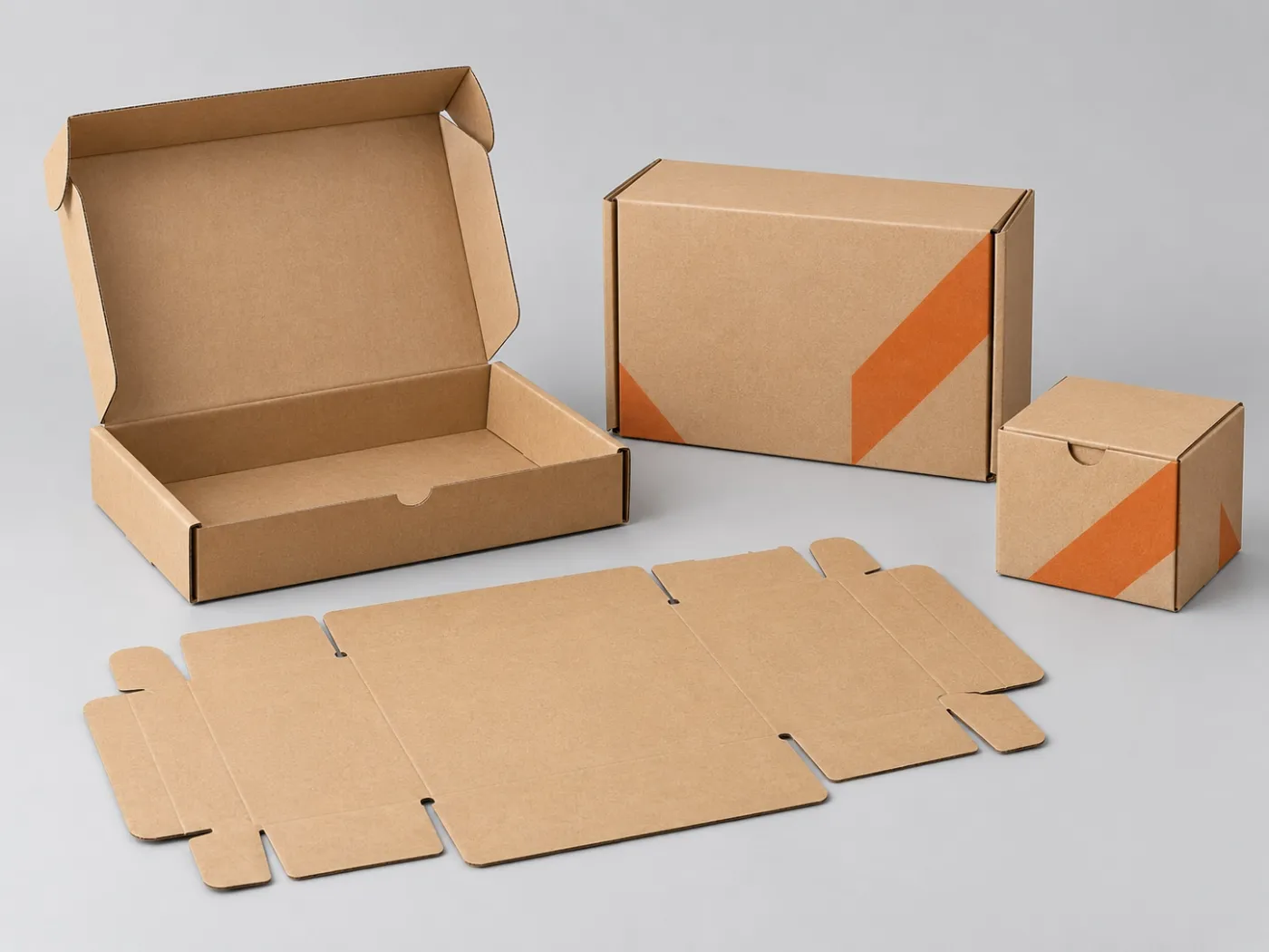 Die-cut mailer boxes and a flat die-cut blank